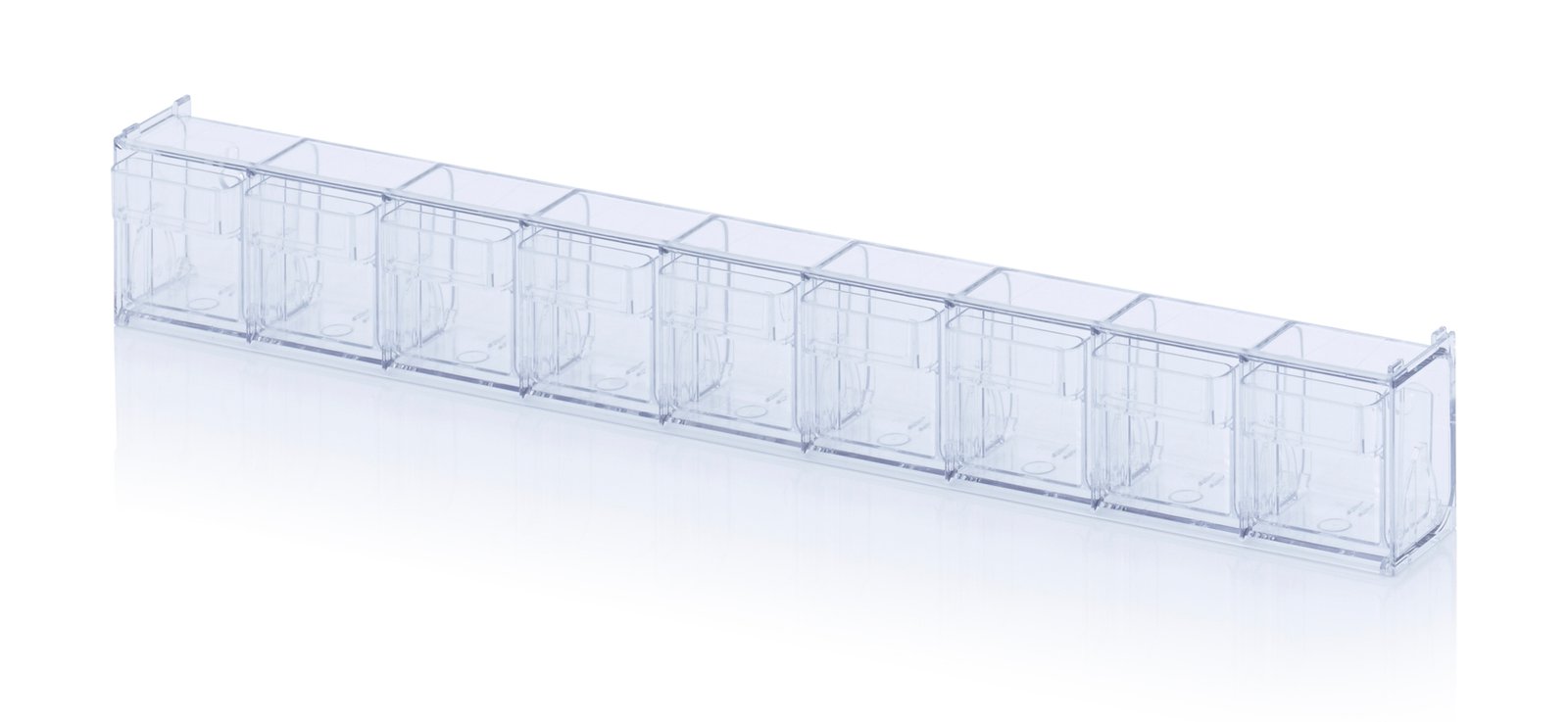 Rangée de 9 boites transparentes